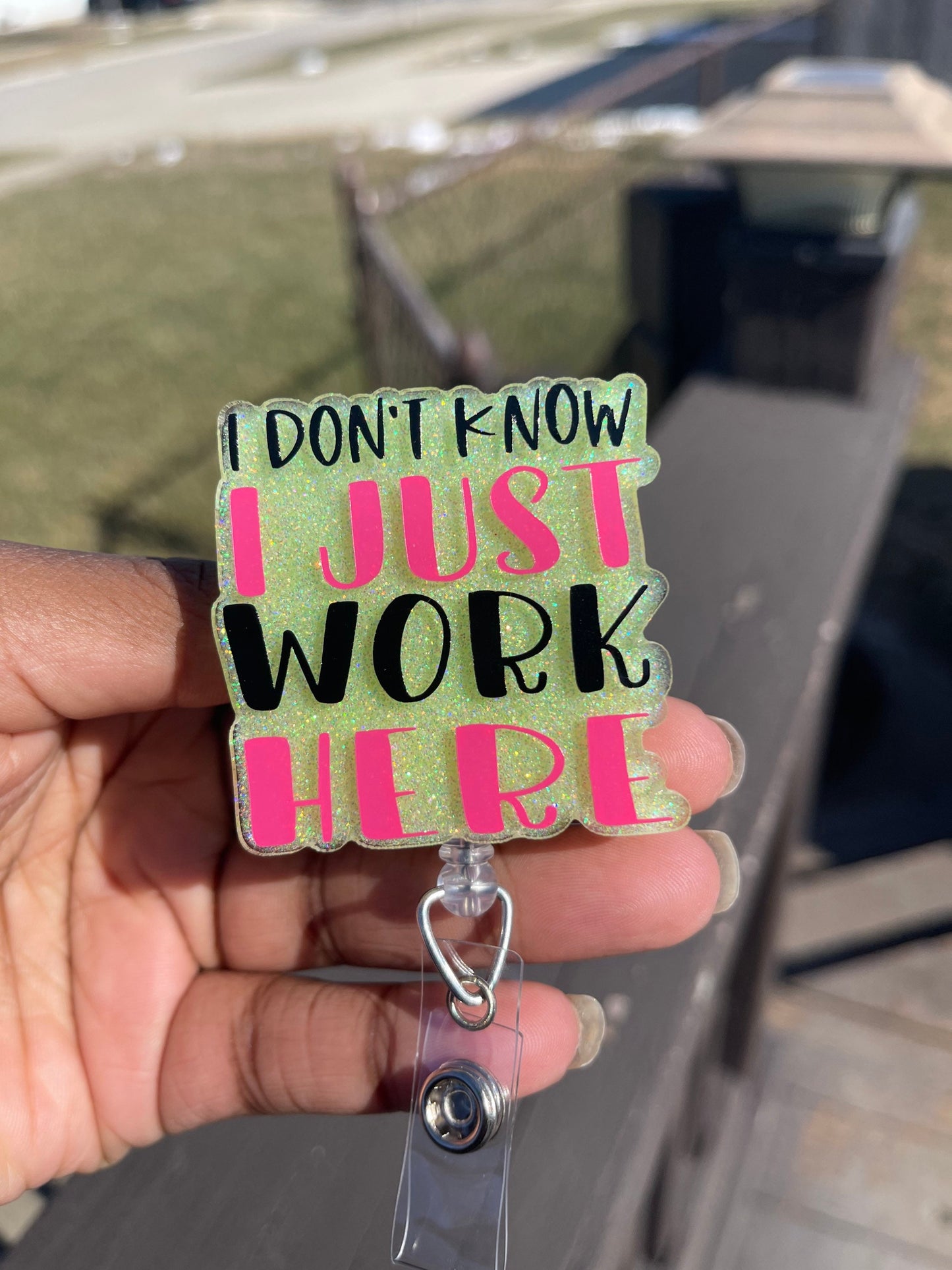 I Just Work Here badge reel