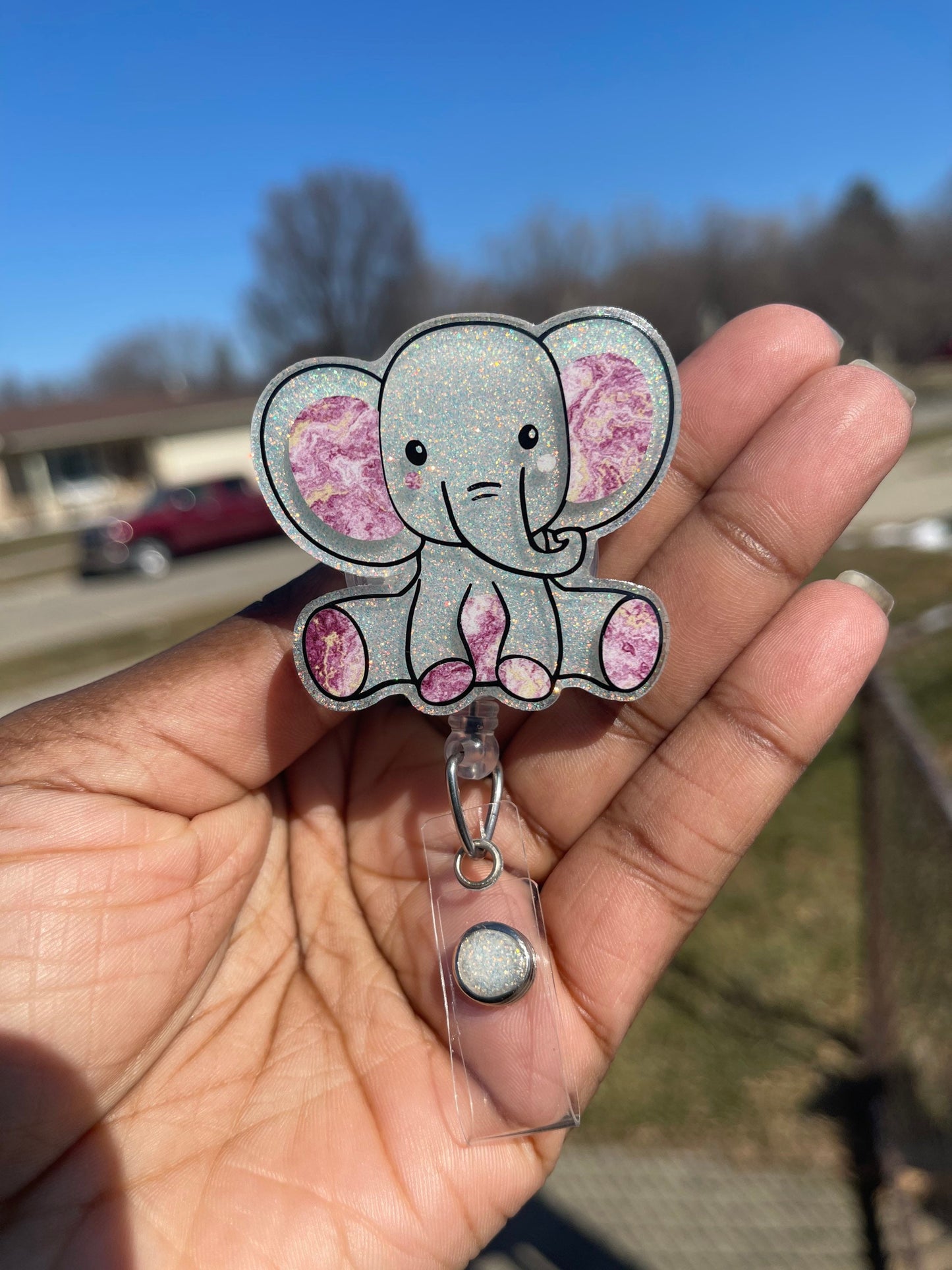 White marbled sitting elephant badge reel