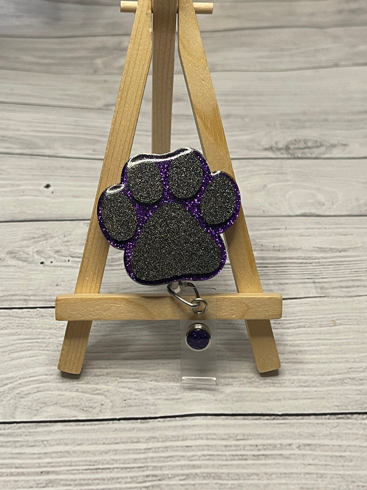 Paw print badge reel