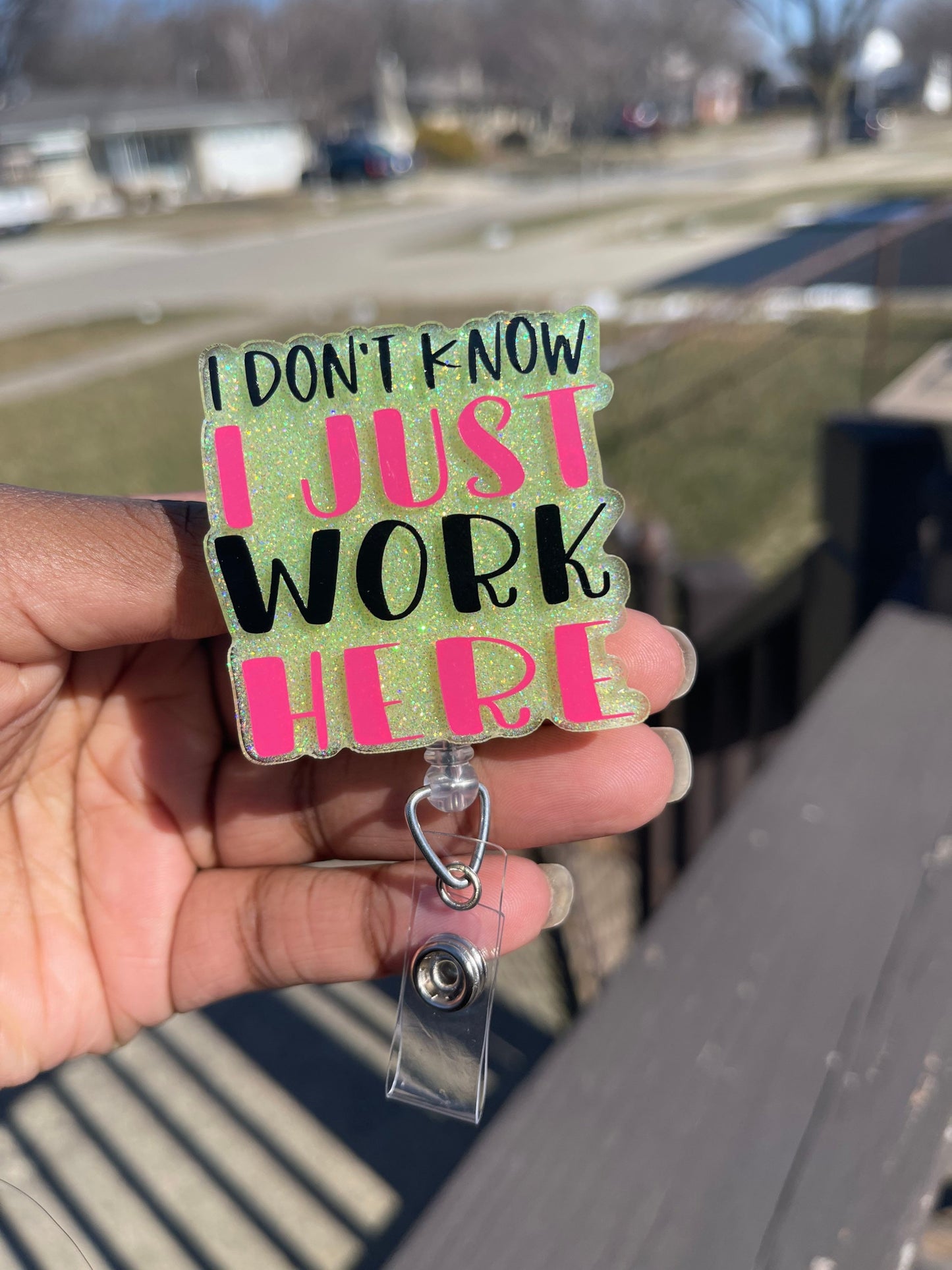 I Just Work Here badge reel