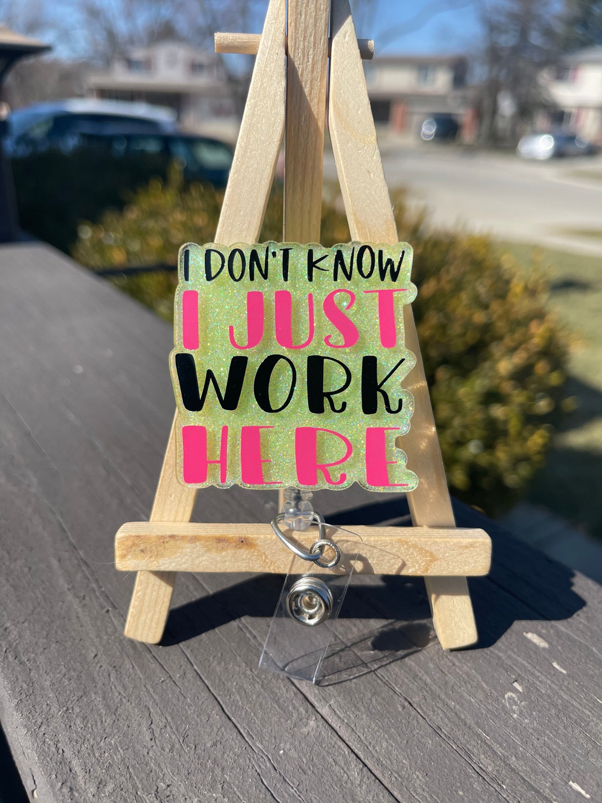 I Just Work Here badge reel